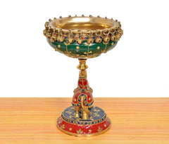Brass elephant urli idol on round base, jeweled green bowl, multicolor decor