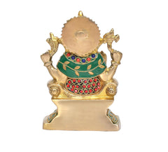 Back view brass Ganesha idol with green belt trim, gold detailing, round halo