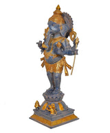Brass standing Ganesha statue, six-armed pose with trident staff and gold accents