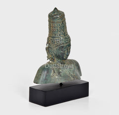 Parvati bronze bust statue, back view with layered hair ornamentation and patina
