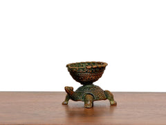 Front view mini brass tortoise oil lamp diya with teal enamel-style patterning