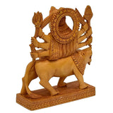 Wooden Durga showpiece with circular halo and trident arms, on lion figure base