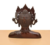 Rückansicht Buddha-Kopfstatue aus Messing: verziertes Haar und braune Ornamente am Kopf