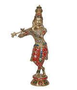 Brass Krishna playing flute sculpture in red dhoti with green accents and jeweled belt