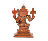 Lakshmi Narasimha brass idol, back view with star-shaped halo and four arms