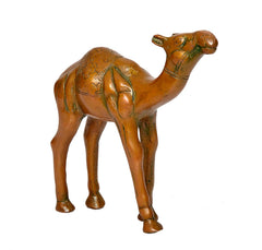 Brass camel figurine three-quarter view, detailed face and textured body