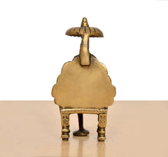 Brass Shirdi Sai Baba statue, underside view showing base and four standing legs