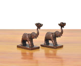 Copper elephant figurines set of 2, profile view with textured body and pedestal