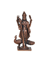 Copper standing deity murti with peacock at feet, raised trident hands, on pedestal