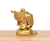 Brass laughing Buddha statue, gold tone, fan-like back detail, seated on round base