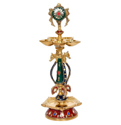 Front view brass chakra oil lamp diya, painted green-red deity with three bowl tops