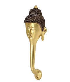 Gold-tone Buddha face door handle with side earlobes and dark hair cap