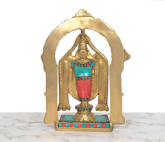 Brass Balaji idol, rear view, tall golden arch, decorated torso and pedestal
