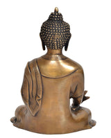 Brass Buddha statue rear view, smooth back and seated lotus base