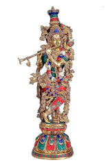 AONA Brass Krishna showpiece, front view, blue-green crown and red-blue patterned skirt