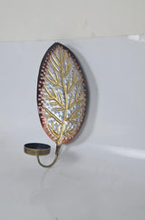 Leaf-shaped metal wall candle holder with gold branches and circular black cup