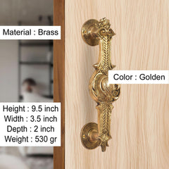 Brass door handle pair, golden finish, round backplates with scrollwork