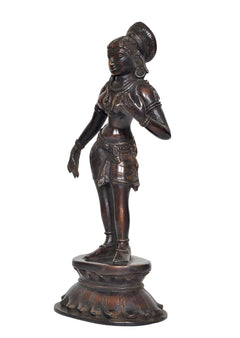 Brass Apsara statue side view, textured headdress and draped body ornaments