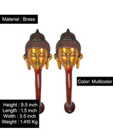Pair of Brass Buddha-face door handles, multicolor gold face and red stem