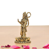 Hanuman Ji brass standing statue from side, rear profile with large circular tail ornament