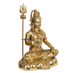 Brass Shiva statue seated with trident, smiling face, bead necklaces, and hand gestures.