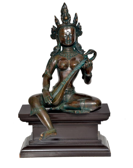 Brass Maa Goddess Saraswati Seated on Wooden PedestalI dol for Home Decor and Pooja (Height 14 Inch)