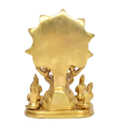 Brass Dakshinamurti Shiva statue back view with ornate halo and small seated devotees