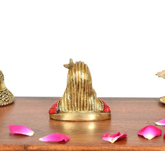 Brass Adiyogi Shiva idol back view, red robe section with blue centerpiece bead
