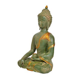 Seated Buddha statue side view, brass green finish with gold-trimmed robe and lotus base