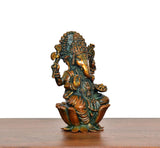 Sitting Lord Ganesha brass statue with multi-armed pose, teal-and-gold painted finish