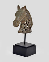 Bronze horse head figurine on stand, front-left view, carved face and pierced mane, base