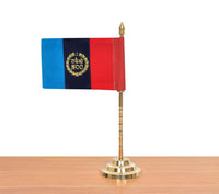 Tabletop flag stand with gold spear finial and tricolor NNC flag, front view