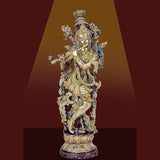 Brass Krishna statue idol playing flute, ornate crown and detailed dancing pose