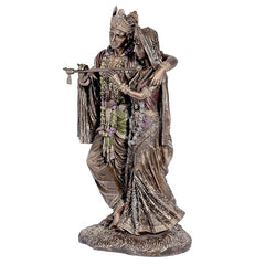 Radha Krishna bonded bronze idol, brown finish; Krishna holds Radha close, flute