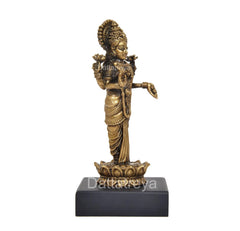 Standing Lakshmi statue, profile view with hand gesture, gold finish on black base