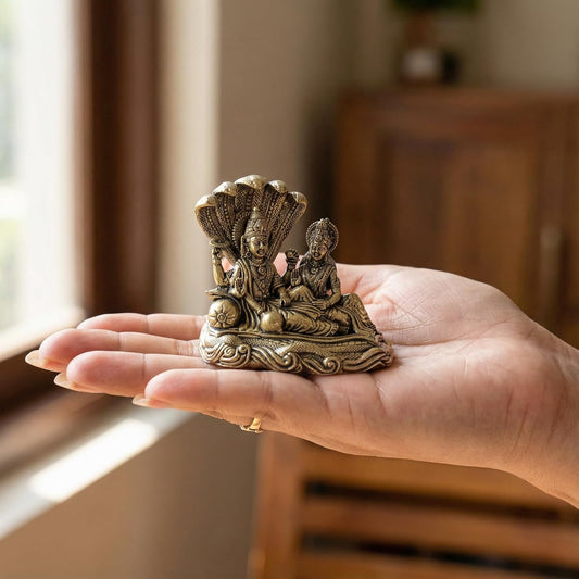 Bronze Small Maa Lakshmi with Lord Vishnu On Sheshnag Idol (Height :2 Inch)