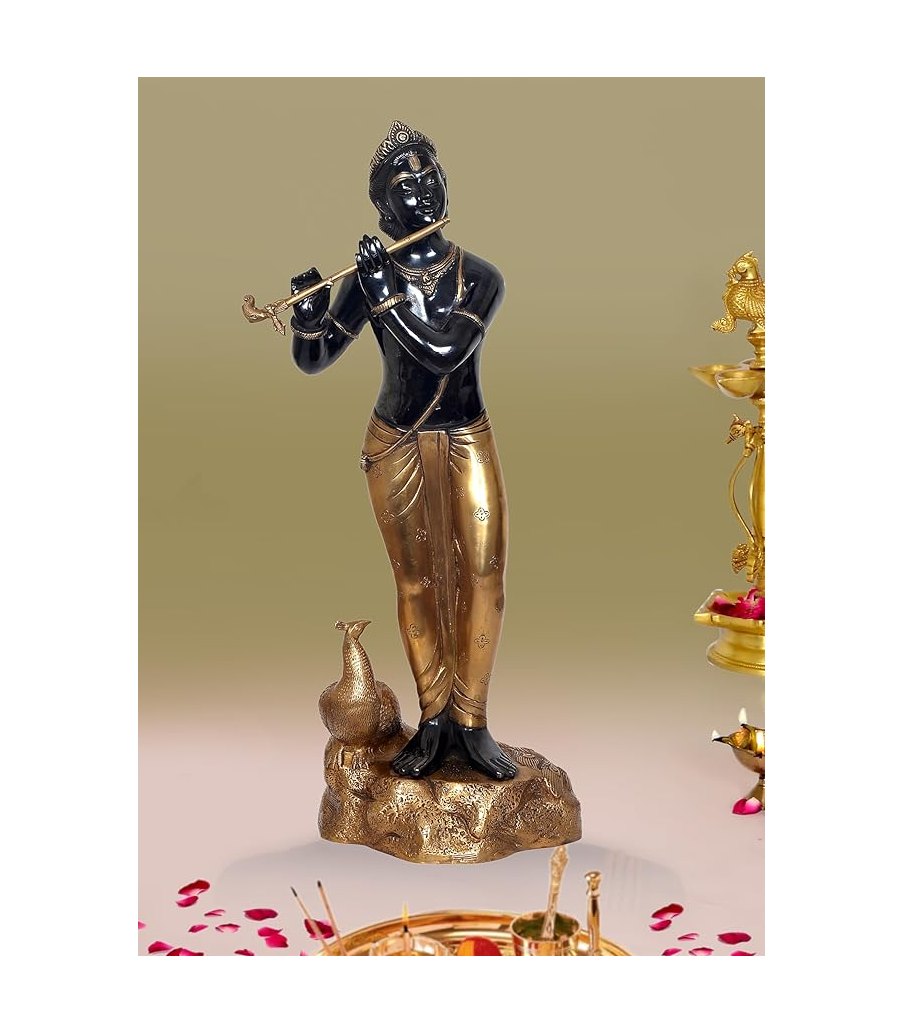 Brass Krishna figurine playing flute, black and gold finish, standing on base