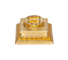 Brass Lakshmi charan paduka front view with embossed lotus-foot print