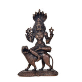 Pratyangira Devi copper statue on ornate base, seated posture with trident-like weapon
