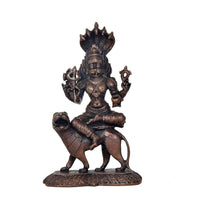 Pratyangira Devi copper statue on ornate base, seated posture with trident-like weapon