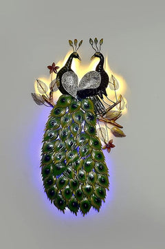 Double iron peacock wall decor with warm LED glow, black peacocks and green feather body