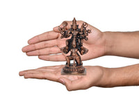 Copper Vishnu decorative showpiece held in hands, multi-armed deity on pedestal base
