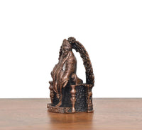Copper Shirdi Sai Baba idol, side profile, ornate arched frame with textured details