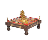 Brass Shiva on chowki with side inscriptions and colorful inlays, red rope accents
