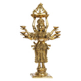 Gold brass standing lady diya holder with eight small bowls and pedestal base