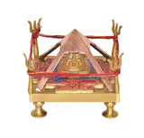 Brass Shri Yantra chowki, red thread across, four gold hand motifs, central golden temple