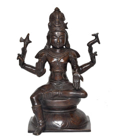 Lord Shiva idol statue, seated posture with multi-armed hands holding tridents, dark brass tone