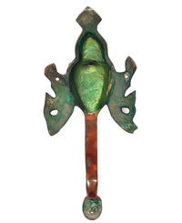 Rear view brass Buddha door handle with green patina and round end knob