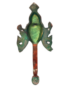 Rear view brass Buddha door handle with green patina and round end knob
