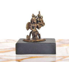Panchaloha Vishnu Lakshmi on Garuda idol, golden, rear-left view, dark base